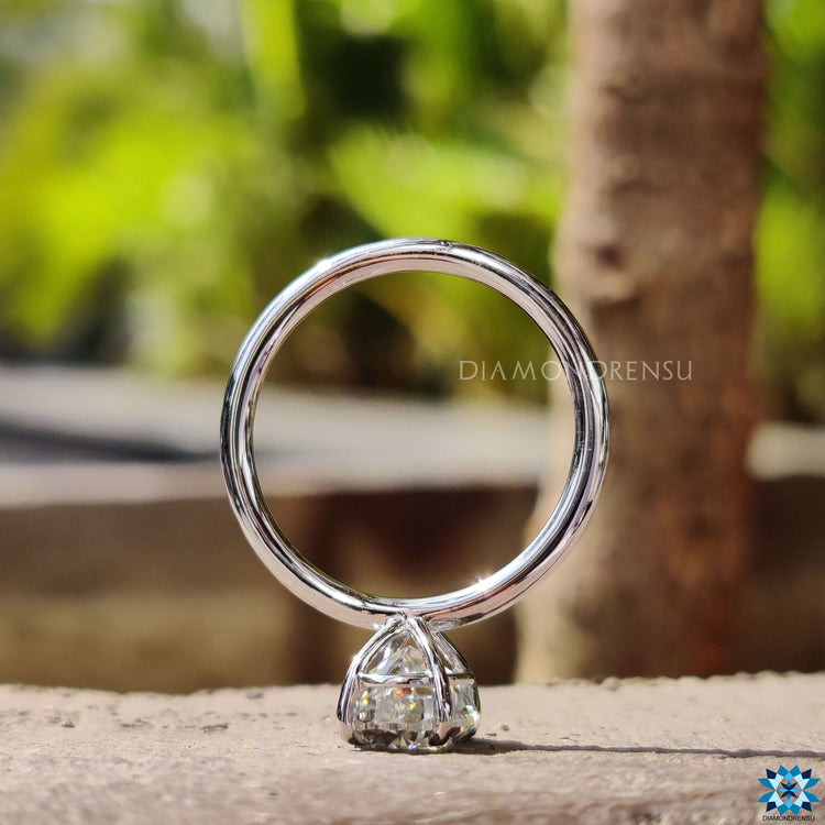 Handmade oval cut moissanite engagement ring.