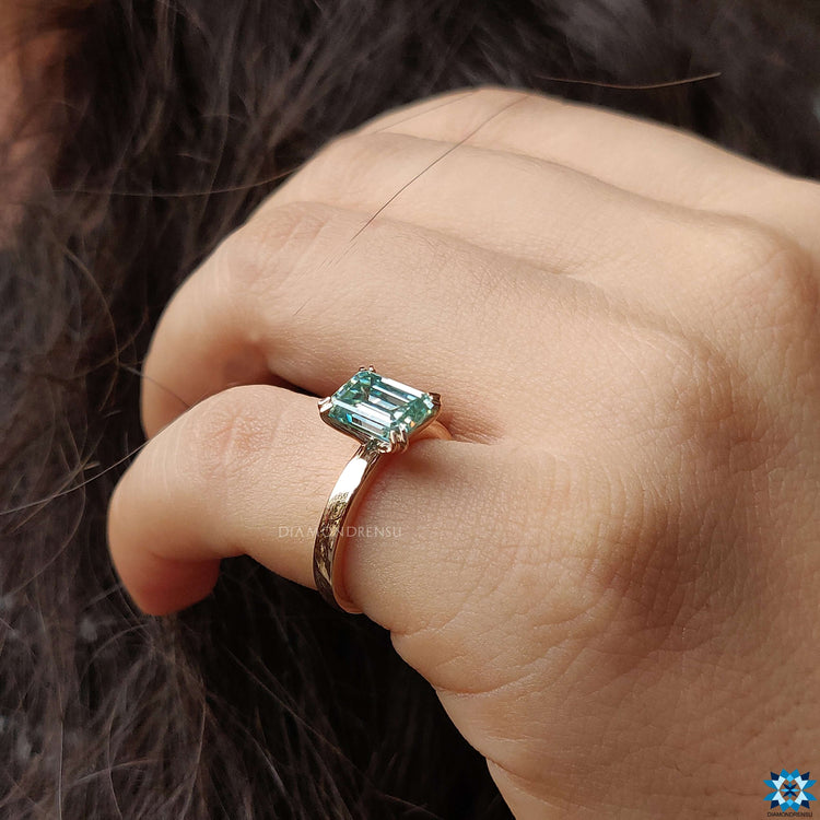 Shop to buy moissanite ring featuring an elegant emerald cut design.