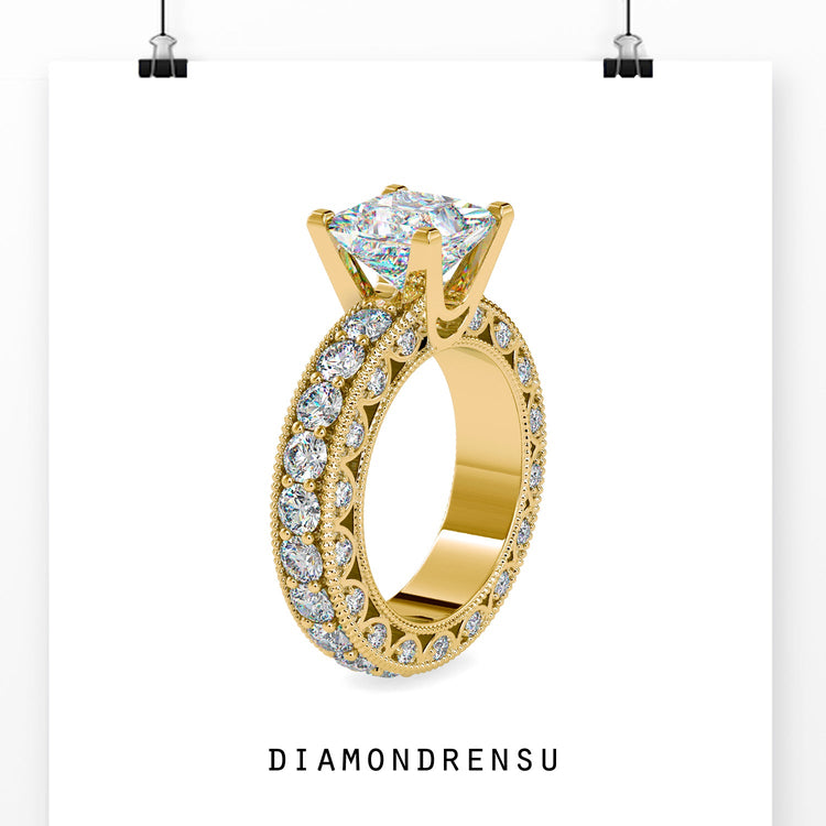 White gold engagement ring with princess cut and side stones.