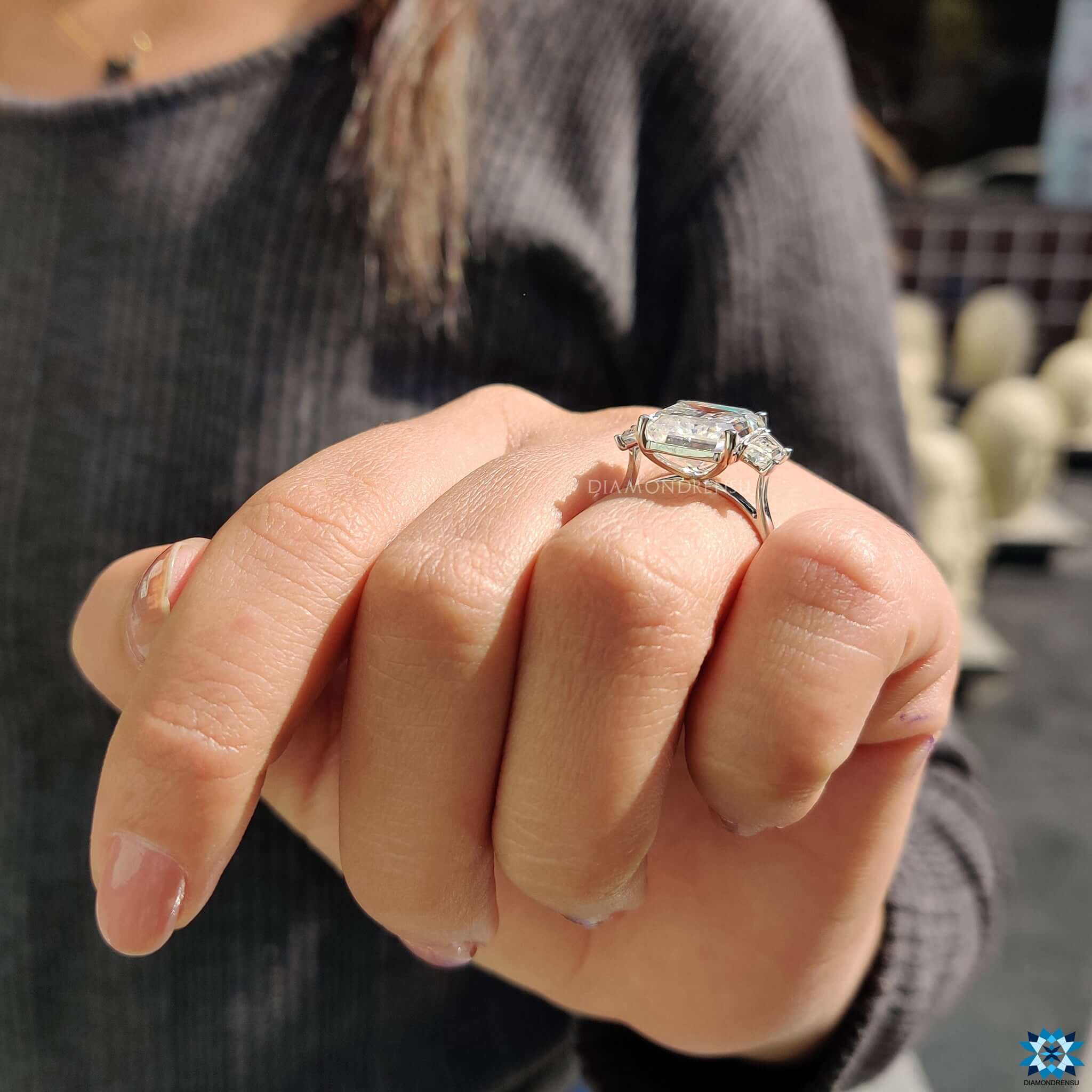 Moissanite engagement ring with cathedral setting.