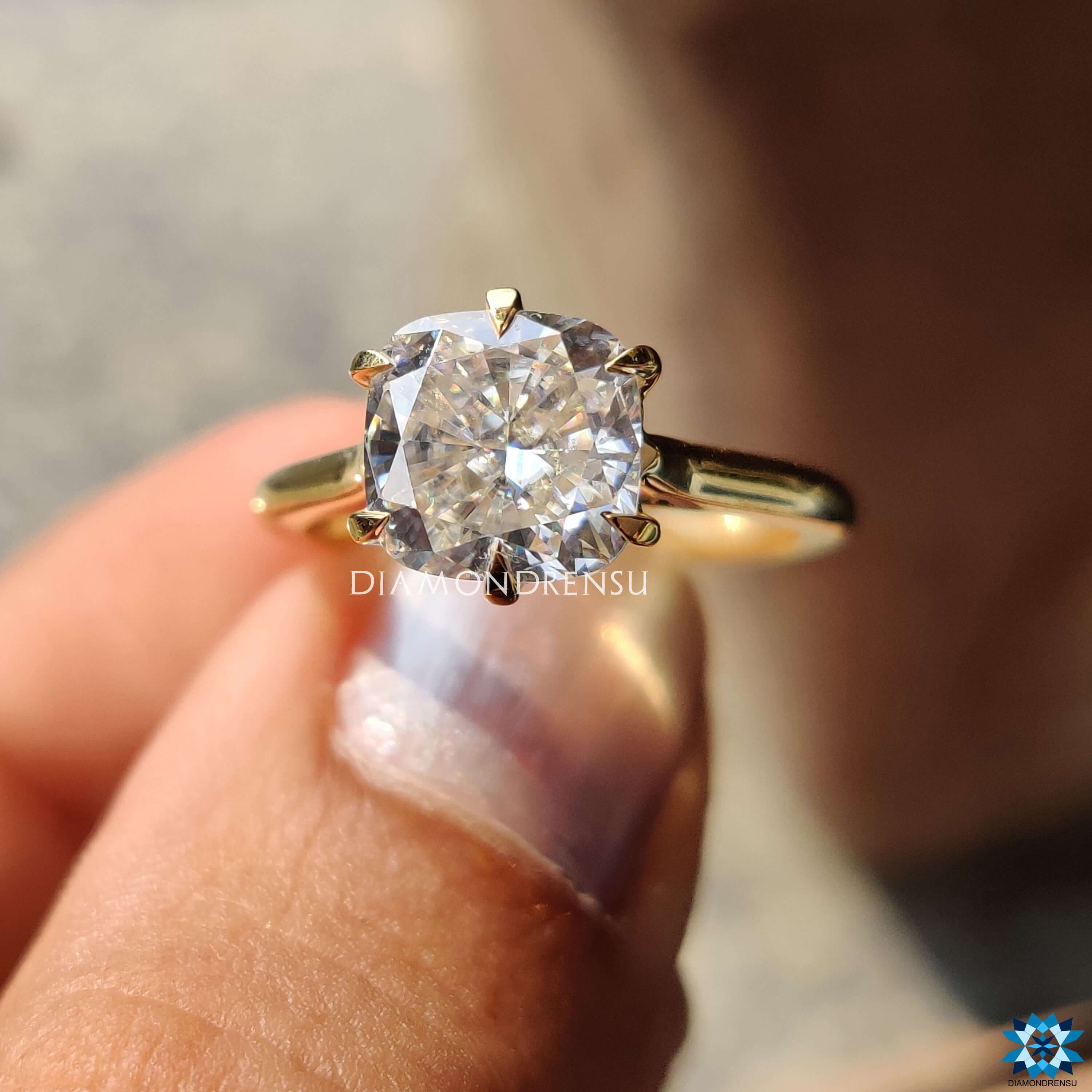 Diamondrensu UK yellow gold cushion moissanite ring.