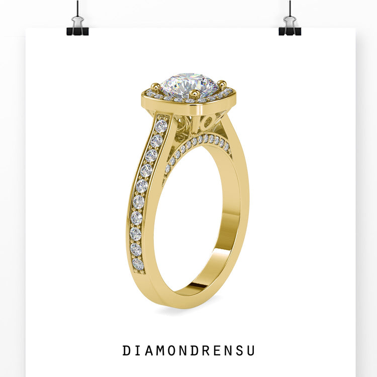 Halo engagement ring in rose gold with round pave band.