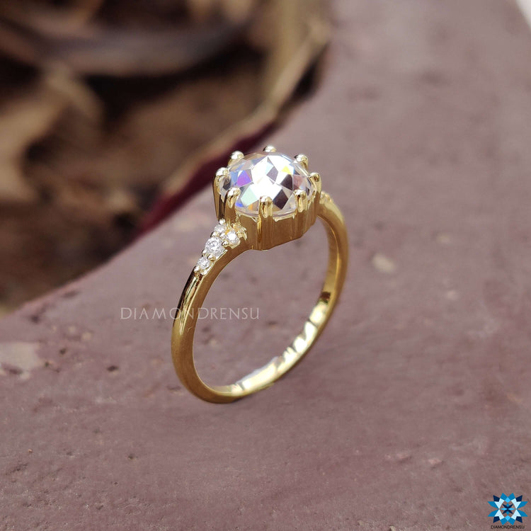 Custom engagement ring crafted with round rose cut moissanite.