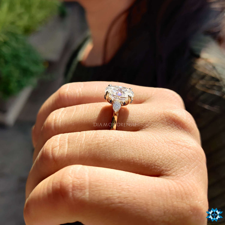 Handmade moissanite ring in yellow gold.