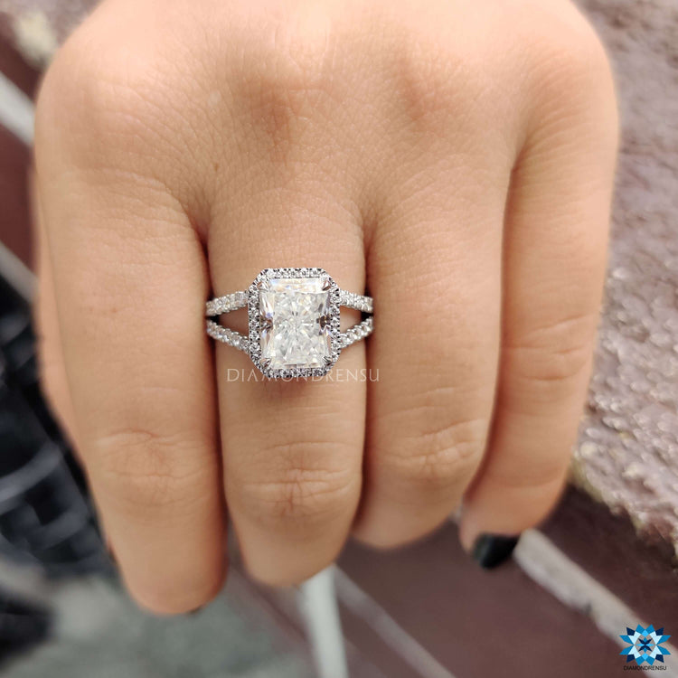 White gold radiant engagement ring with prong setting.