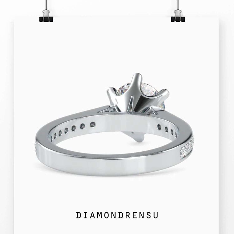 Diamondrensu UK engagement ring with channel set and 6 prong head.