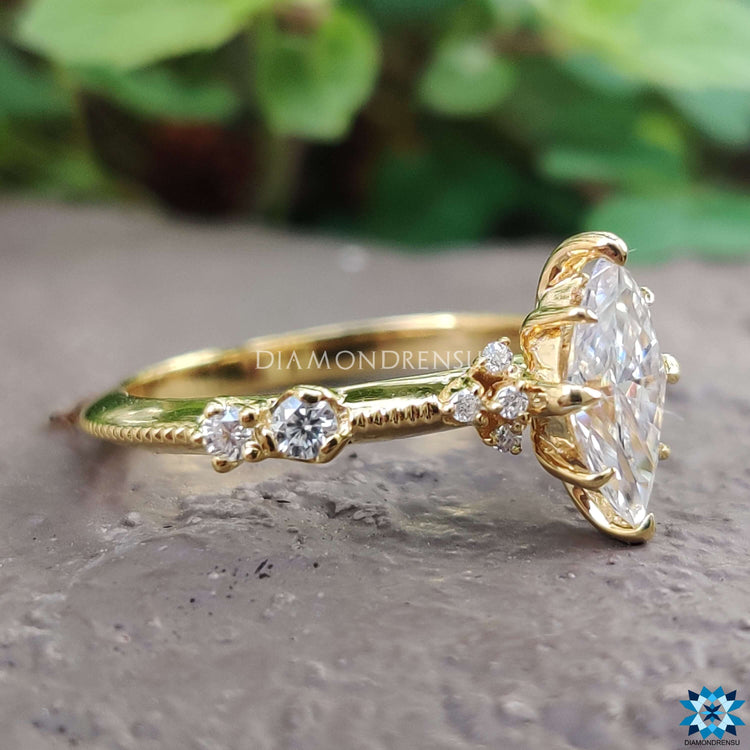 Diamondrensu UK marquise cut moissanite engagement ring.