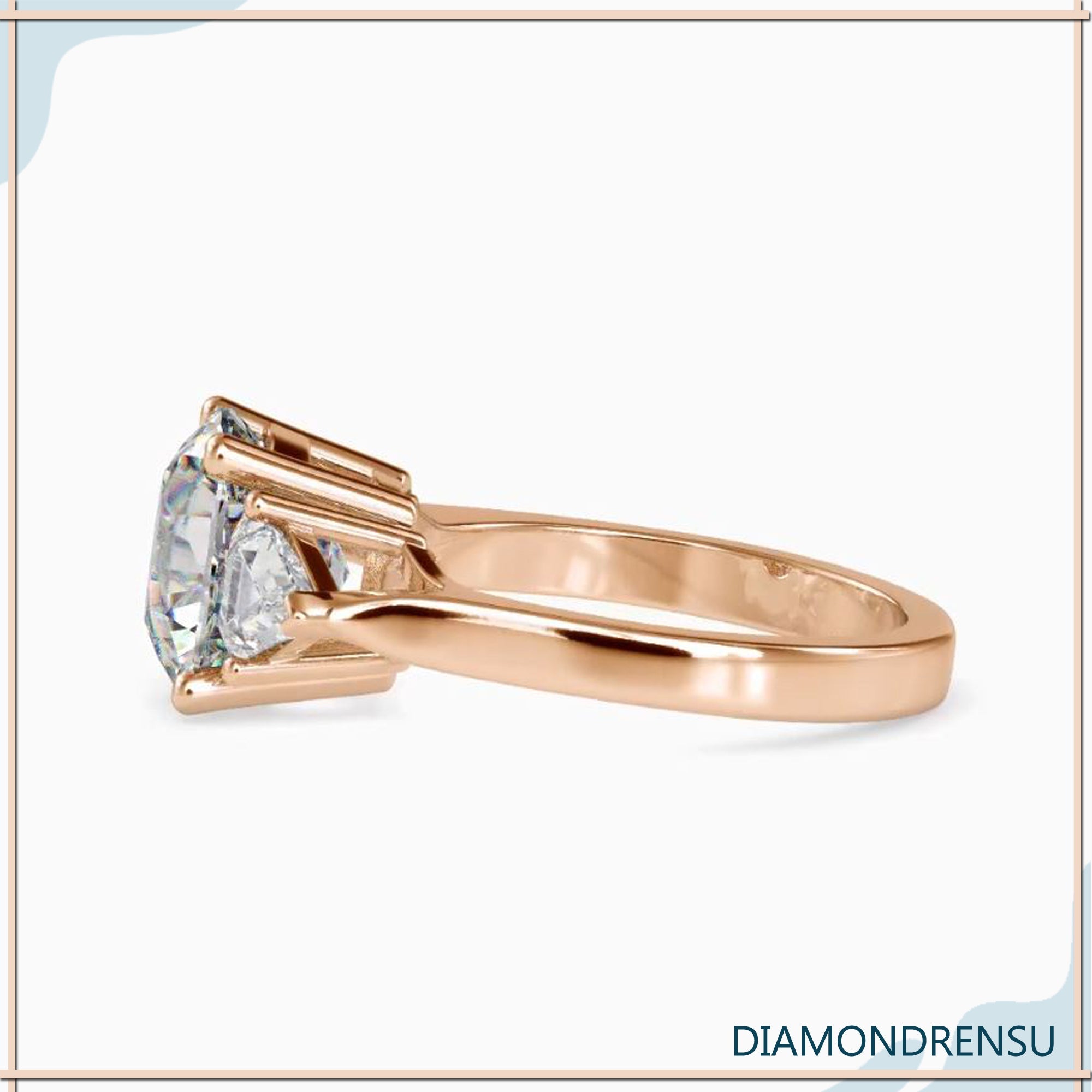 Yellow gold ring with cushion cut centre and kite shaped accents.