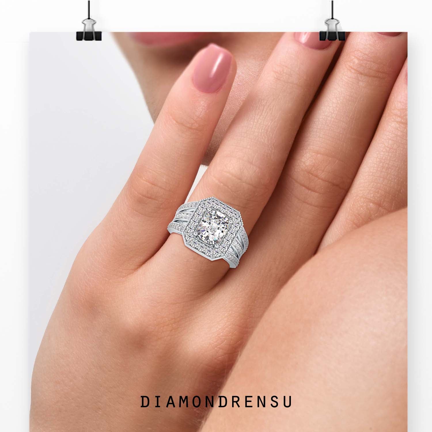 Cushion cut diamond ring with split pave band in rose gold.