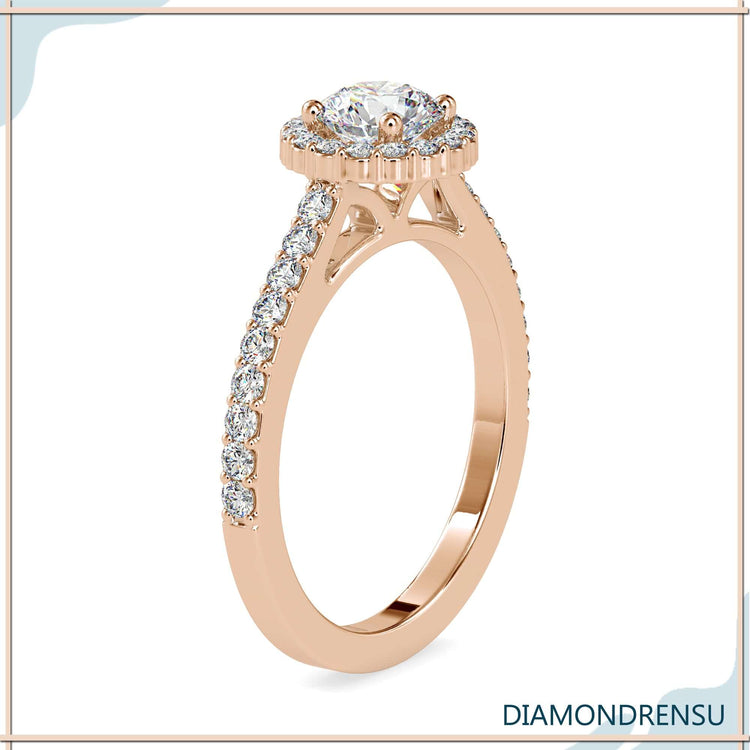 Rose gold engagement ring with a stunning round cut halo ring design.