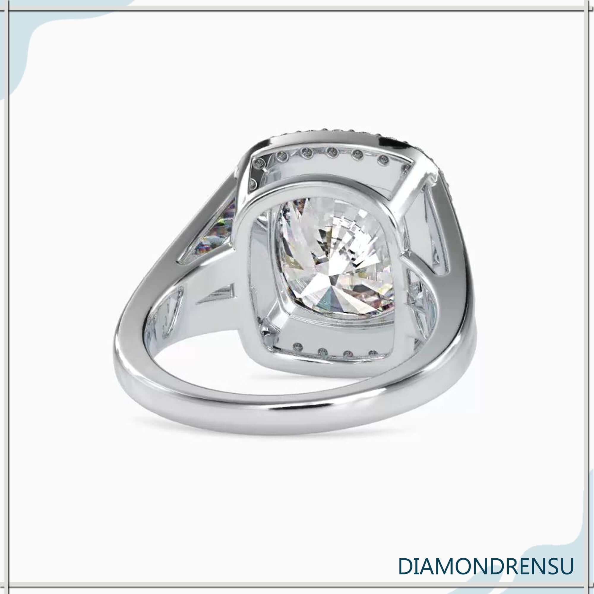 Lab grown diamond engagement ring with halo and round cut.