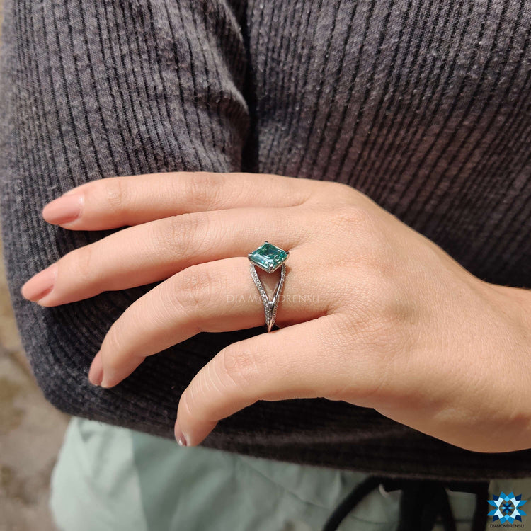 Handmade moissanite ring with 4 prong setting.