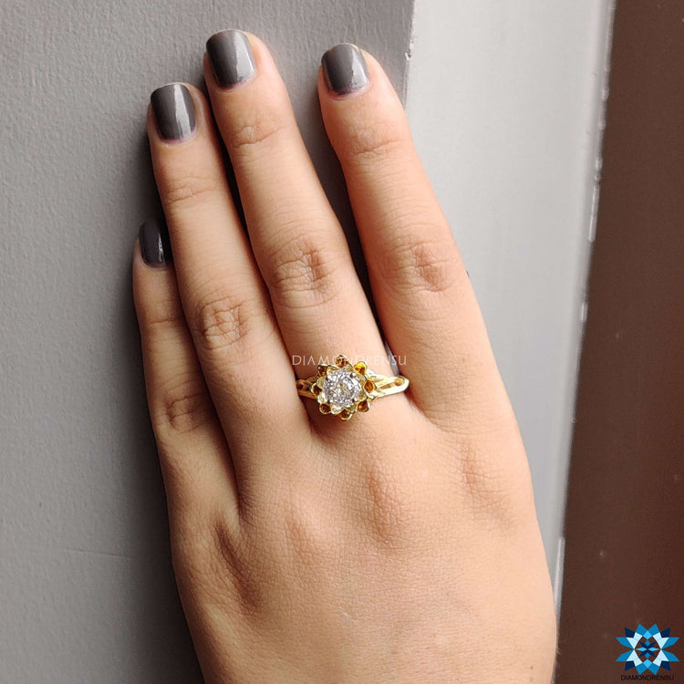 Stunning vintage moissanite ring, perfect for a classic and romantic proposal.