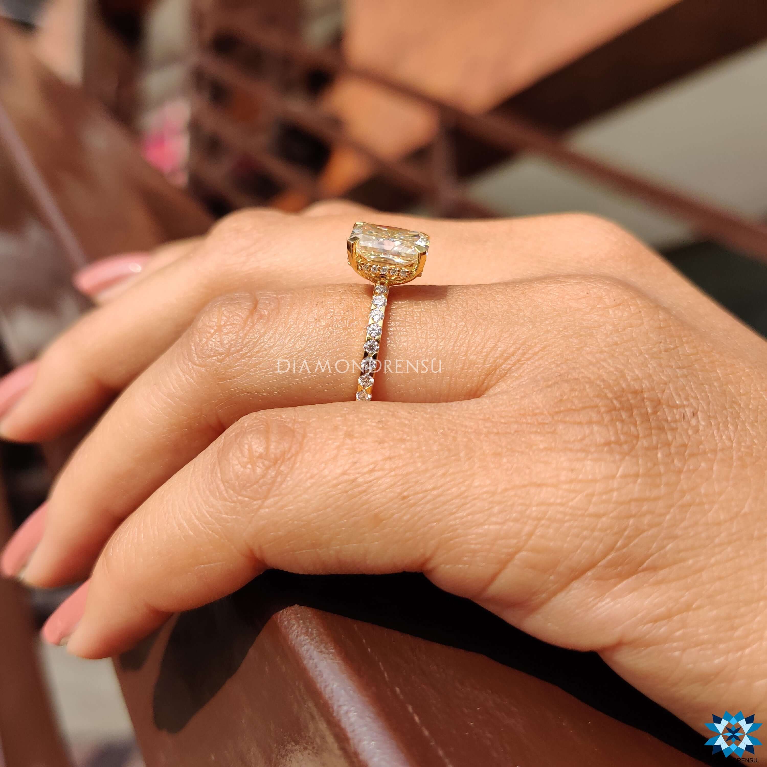 Handmade jewelry featuring radiant cut moissanite.