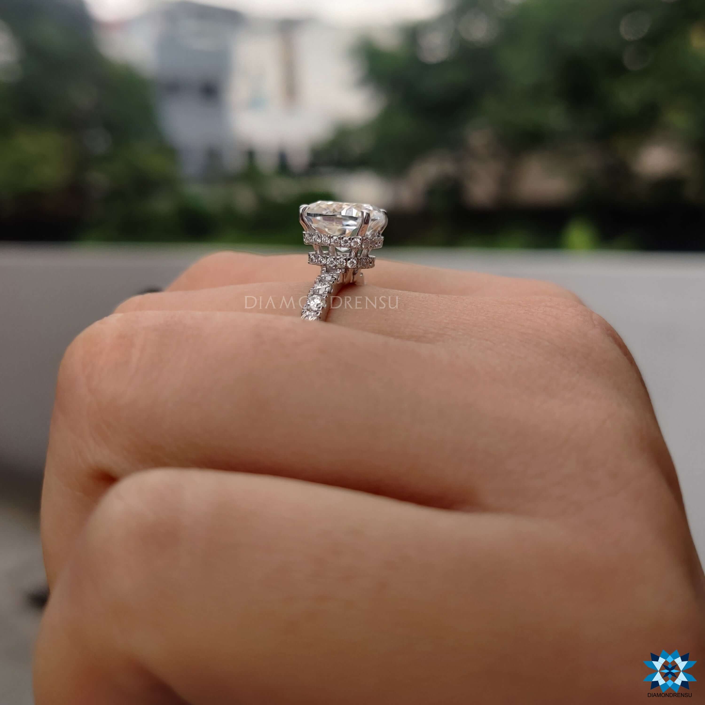 Cushion cut engagement ring in 4 prong setting.