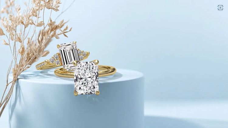 Emerald cut vs radiant cut diamond engagement rings comparison in yellow gold settings
