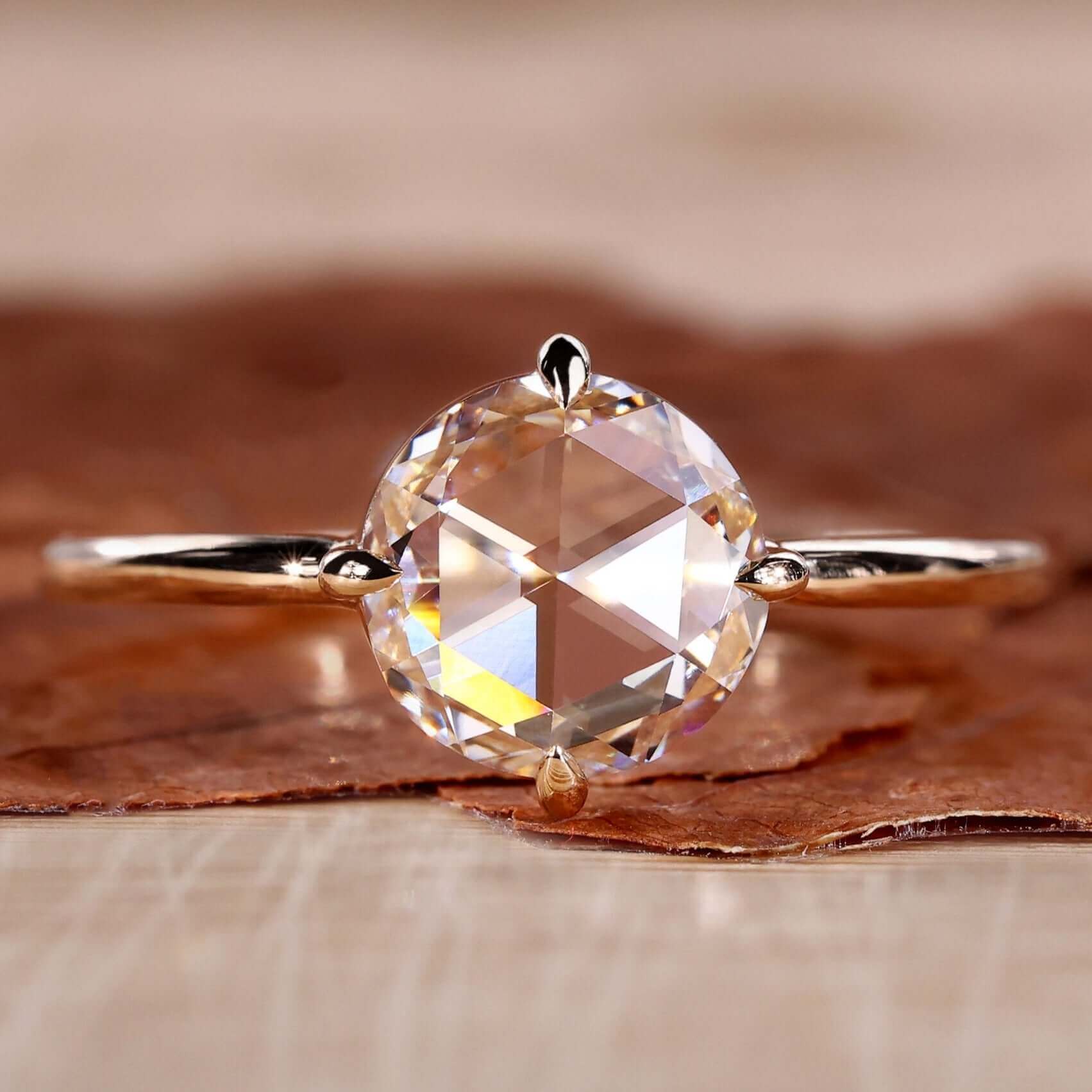 Rose cut diamond ring with a delicate handcrafted design.