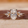 Oval diamond ring in yellow gold with a classic prong setting.
