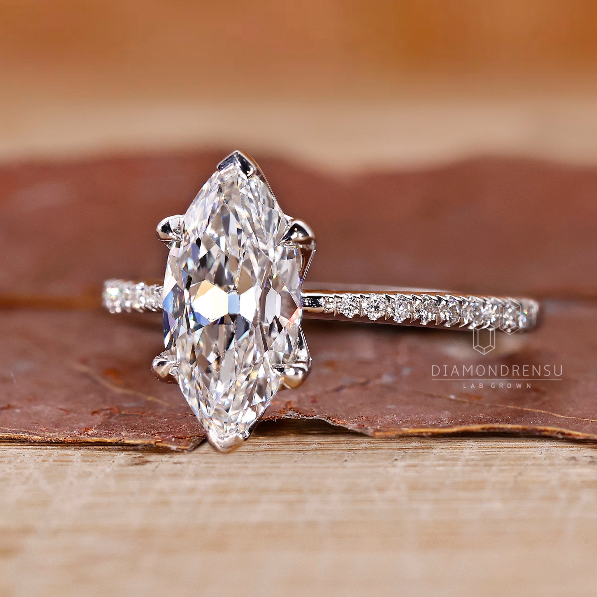 Lab grown diamond ring with white gold band and claw prong setting.

