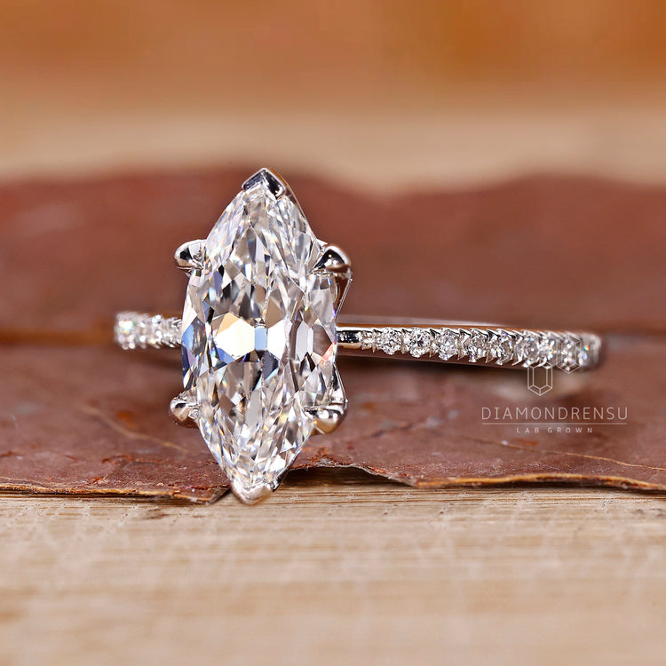 Lab grown diamond ring with white gold band and claw prong setting.
