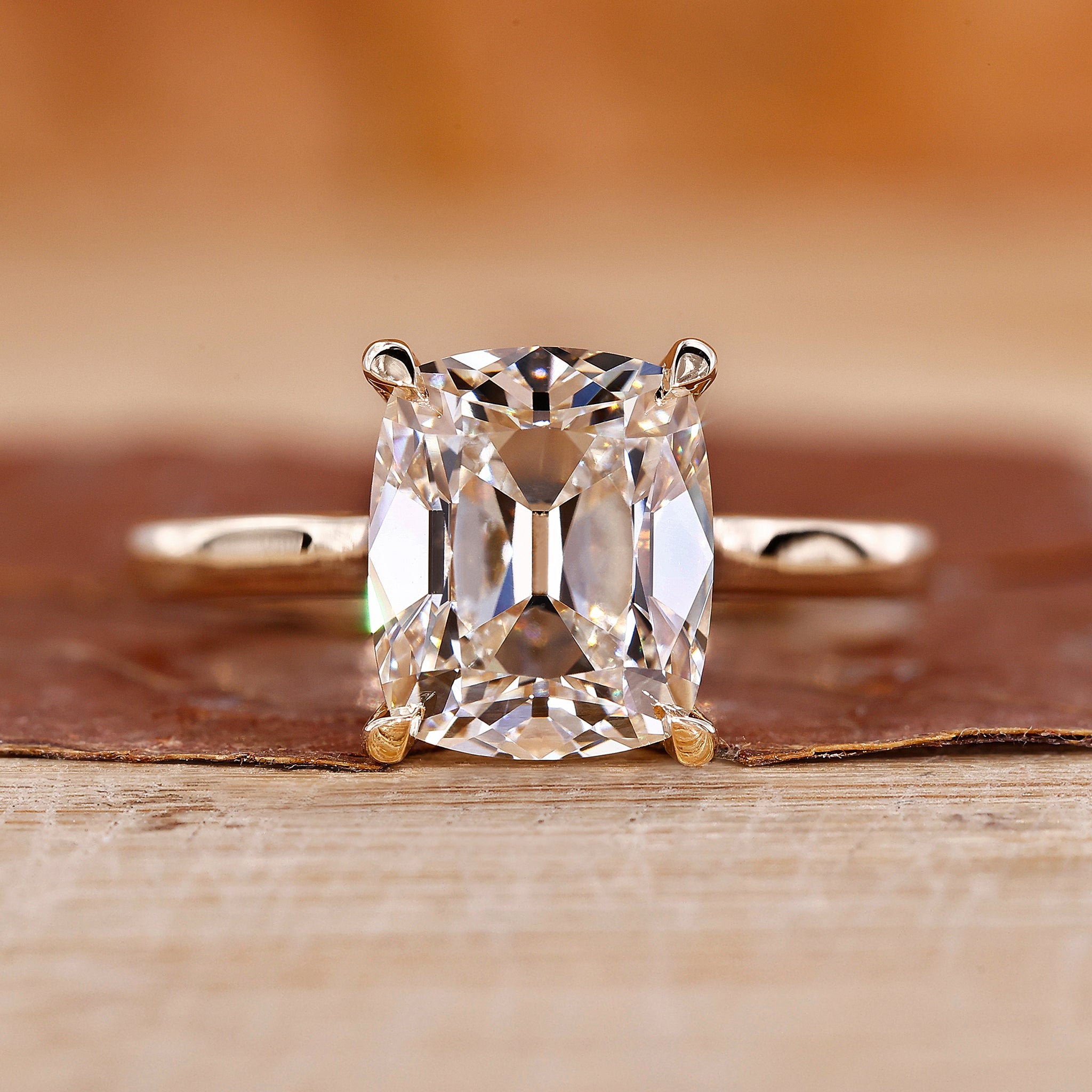 Old Mine Cut Diamond Ring is crafted with a cushion cut diamond and yellow gold ring.

