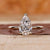 Pear cut diamond ring in a yellow gold setting.
