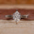 Dutch marquise diamond ring with dual shank setting.

