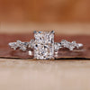 Radiant cut diamond ring with claw prong ring setting.
