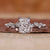 Radiant cut diamond ring with claw prong ring setting.

