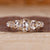 Rose cut diamond ring with oval center stone.
