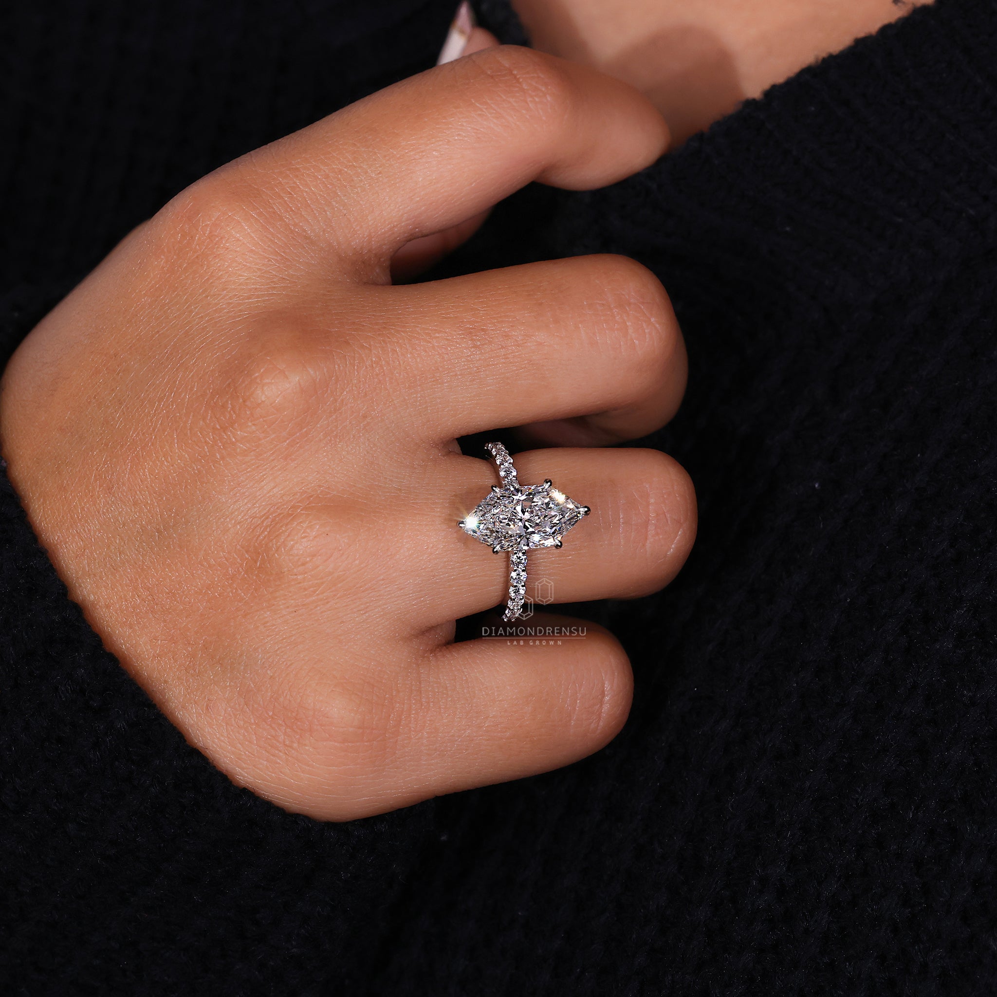 Diamondrensu UK engagement ring in a pavé setting.

