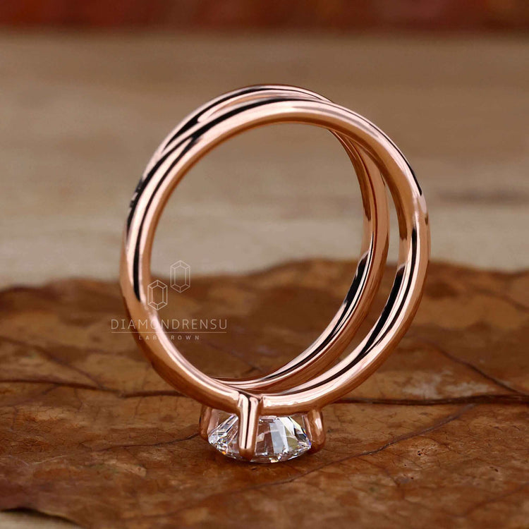 Gold solitaire engagement ring with a stunning round cut diamond.