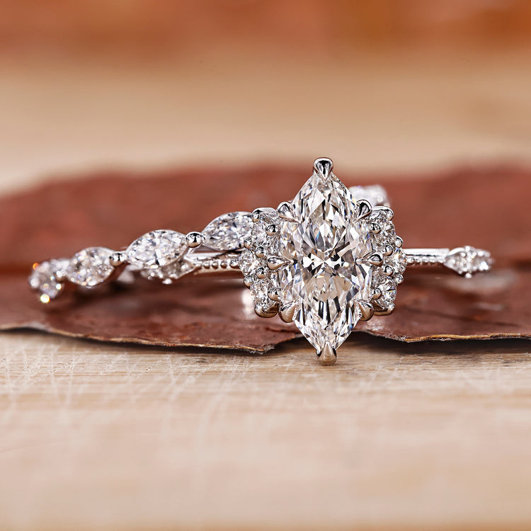 Marquise cut diamond band paired with shared prong wedding band.
