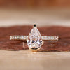 Pear diamond engagement ring with stunning craftsmanship.