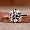 Elegant round diamond engagement ring showcasing timeless design.