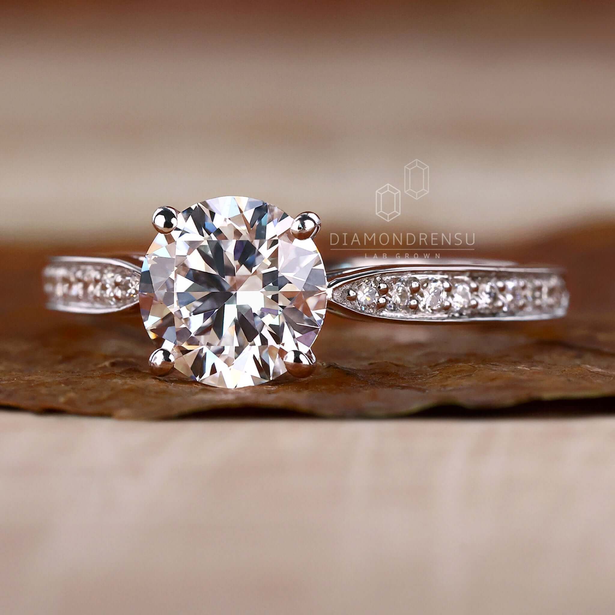 Pave ring featuring a shared prong engagement ring design, ideal for modern and sophisticated proposals.