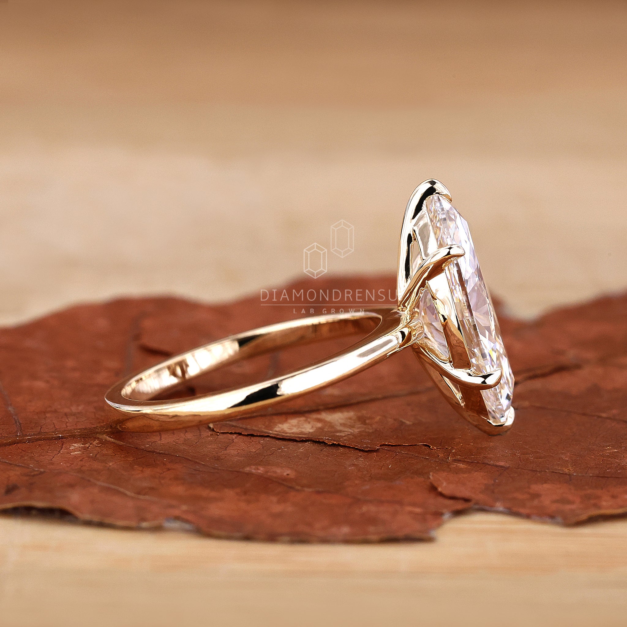 Solitaire engagement ring with marquise cut.
