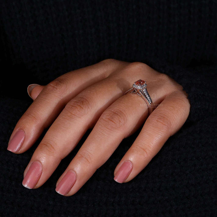 Halo diamond ring featuring a cathedral setting and a radiant cut diamond, ideal for engagements.