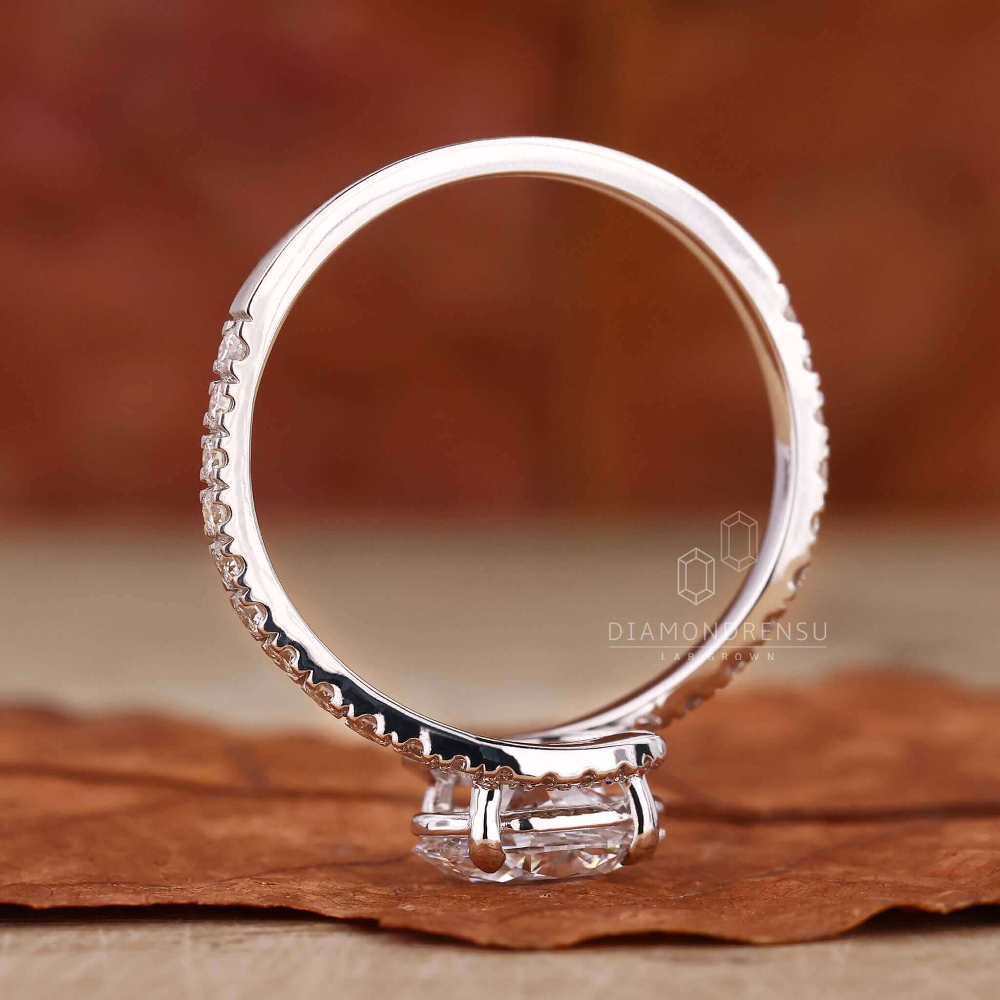 Oval diamond engagement ring in a classic claw prong setting for a dazzling look.