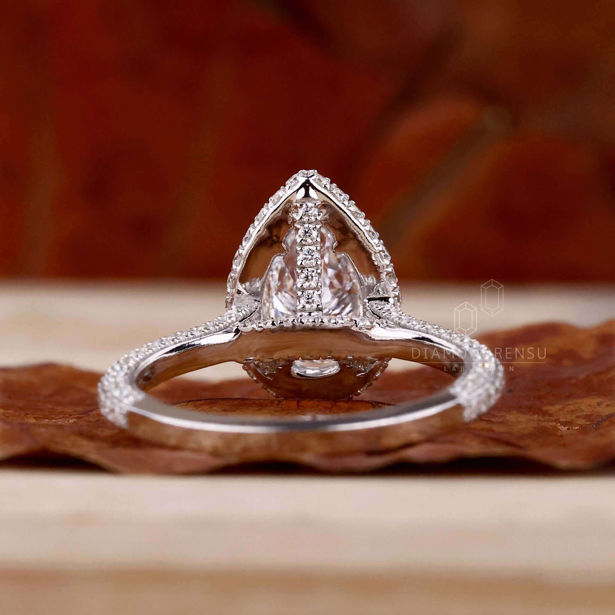 Pear shaped ring with a stunning double halo ring crafted for a unique engagement look.
