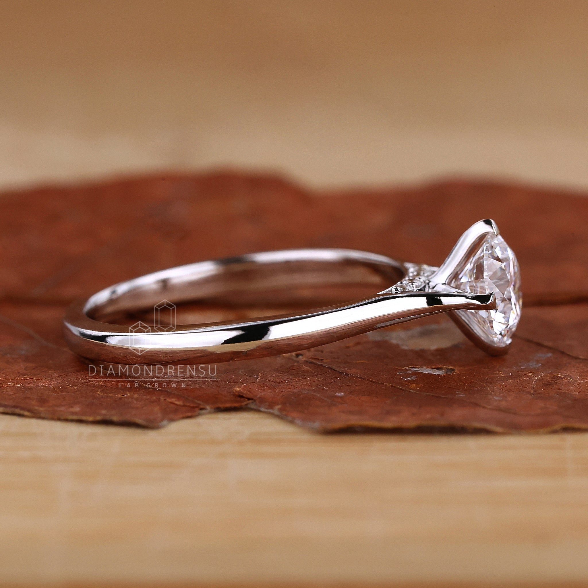 Solitaire diamond ring in a sleek 4 prong ring setting.