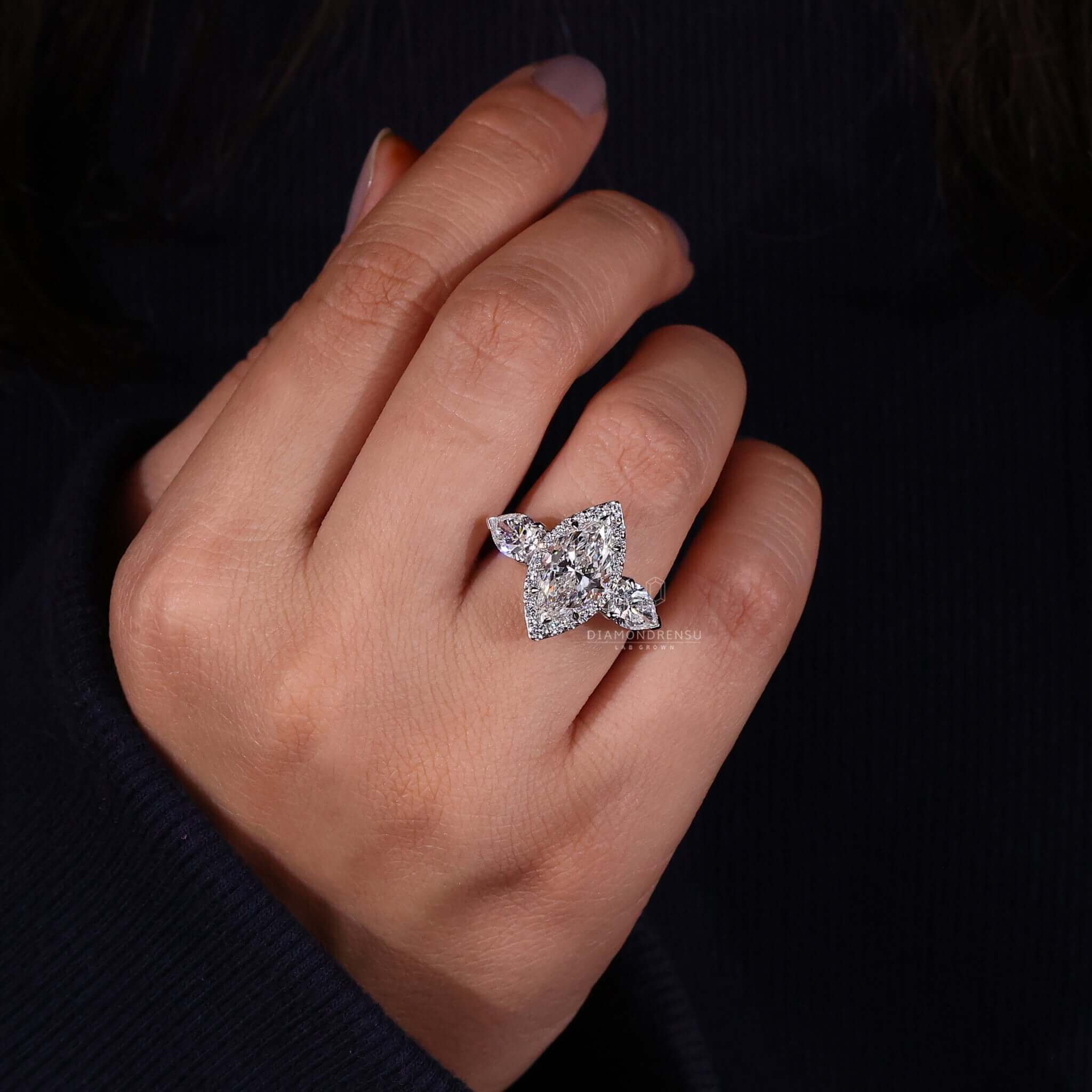 Halo diamond ring crafted with a marquise cut centrepiece, perfect for the UK market.