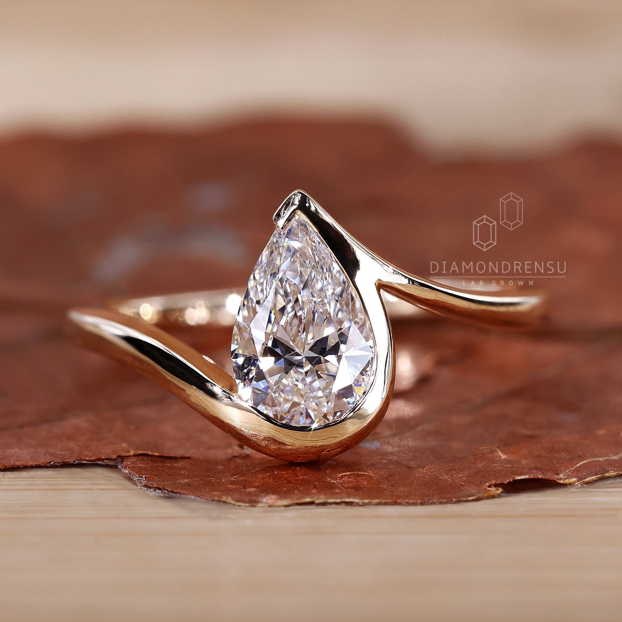 Pear cut diamond engagement ring with brilliant clarity.