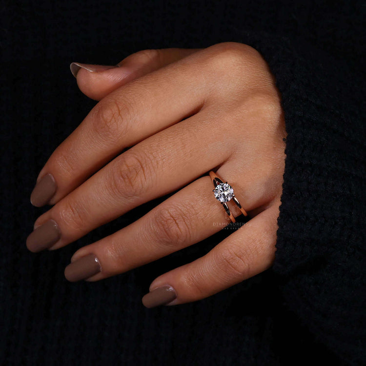 Brilliant cut diamond engagement ring with handmade charm in the UK.