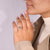 Tapered baguette engagement ring in three stone style.
