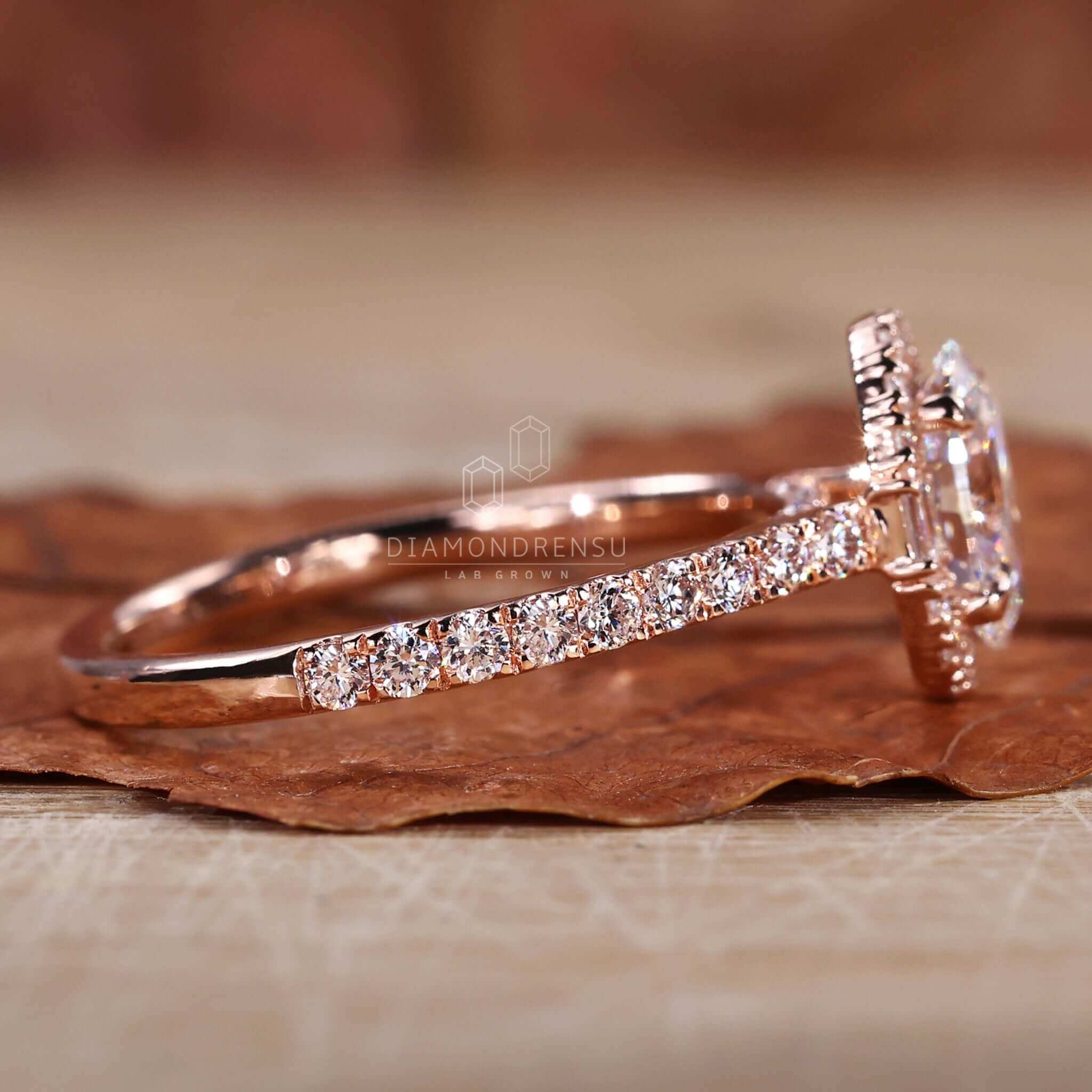 Elegant oval diamond ring with baguette accents for a classic touch.