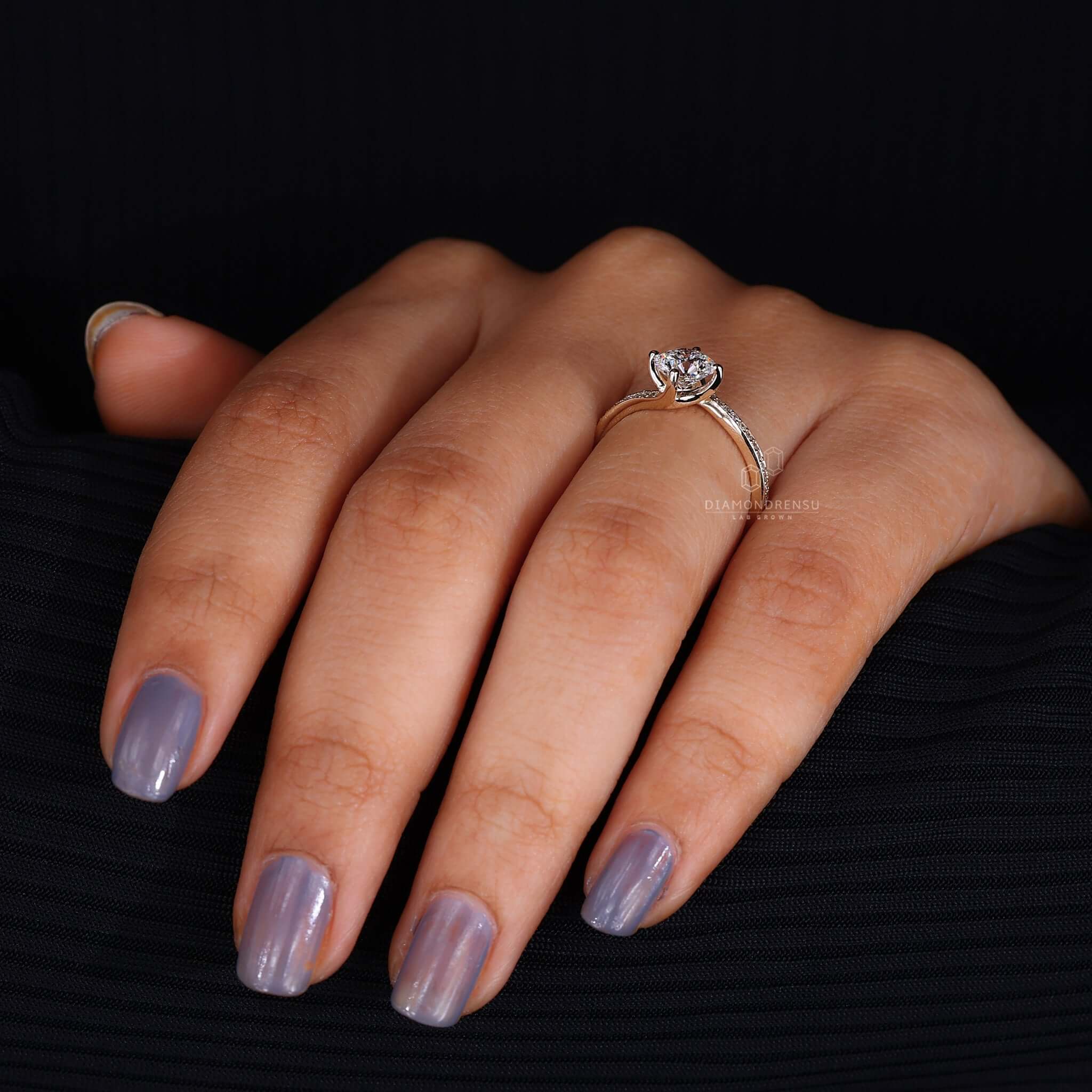 A unique engagement ring UK crafted with lab-grown diamonds in a pave setting.