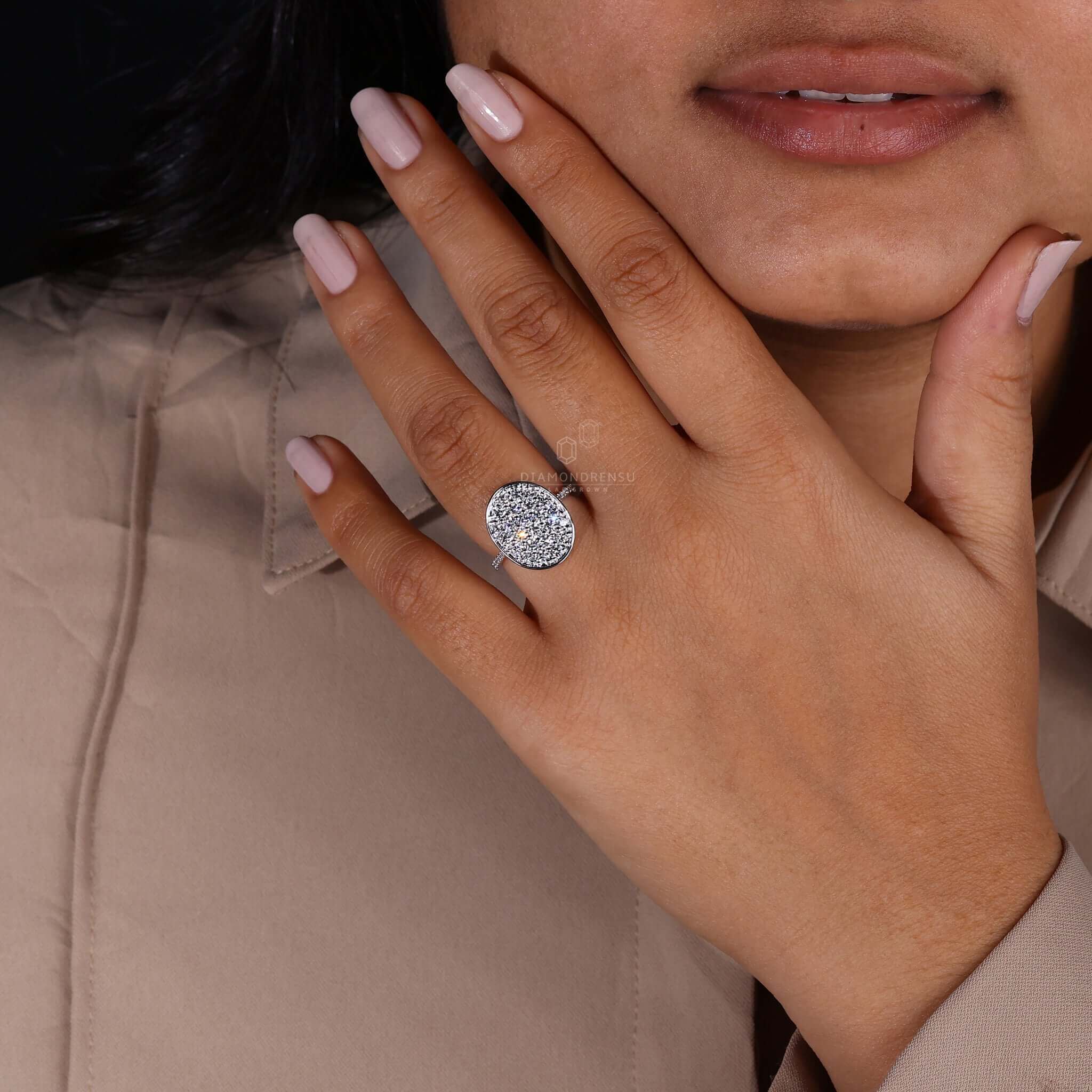 Handmade jewellery featuring a white gold diamond cluster ring.