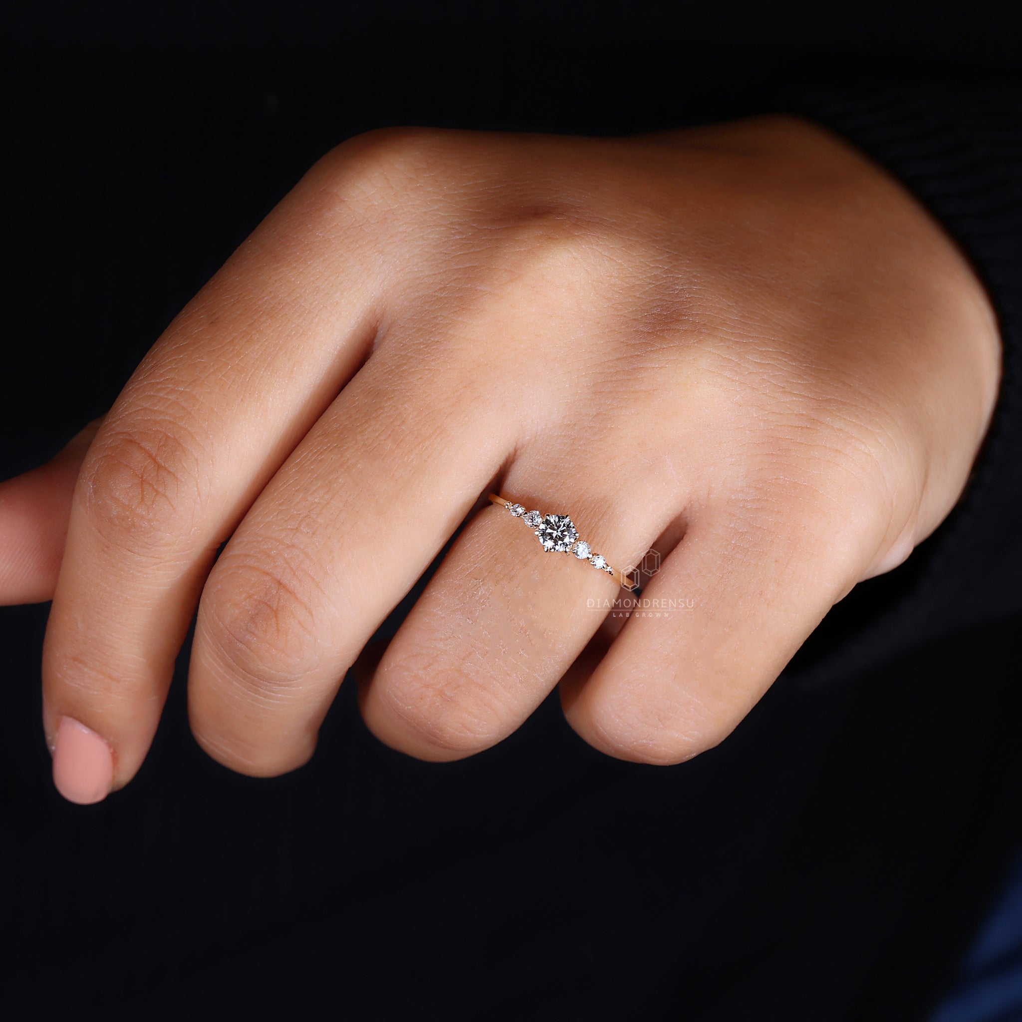 Yellow gold engagement ring with 5 stones.
