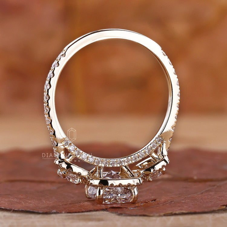 Yellow gold ring with cushion cut ring detail
